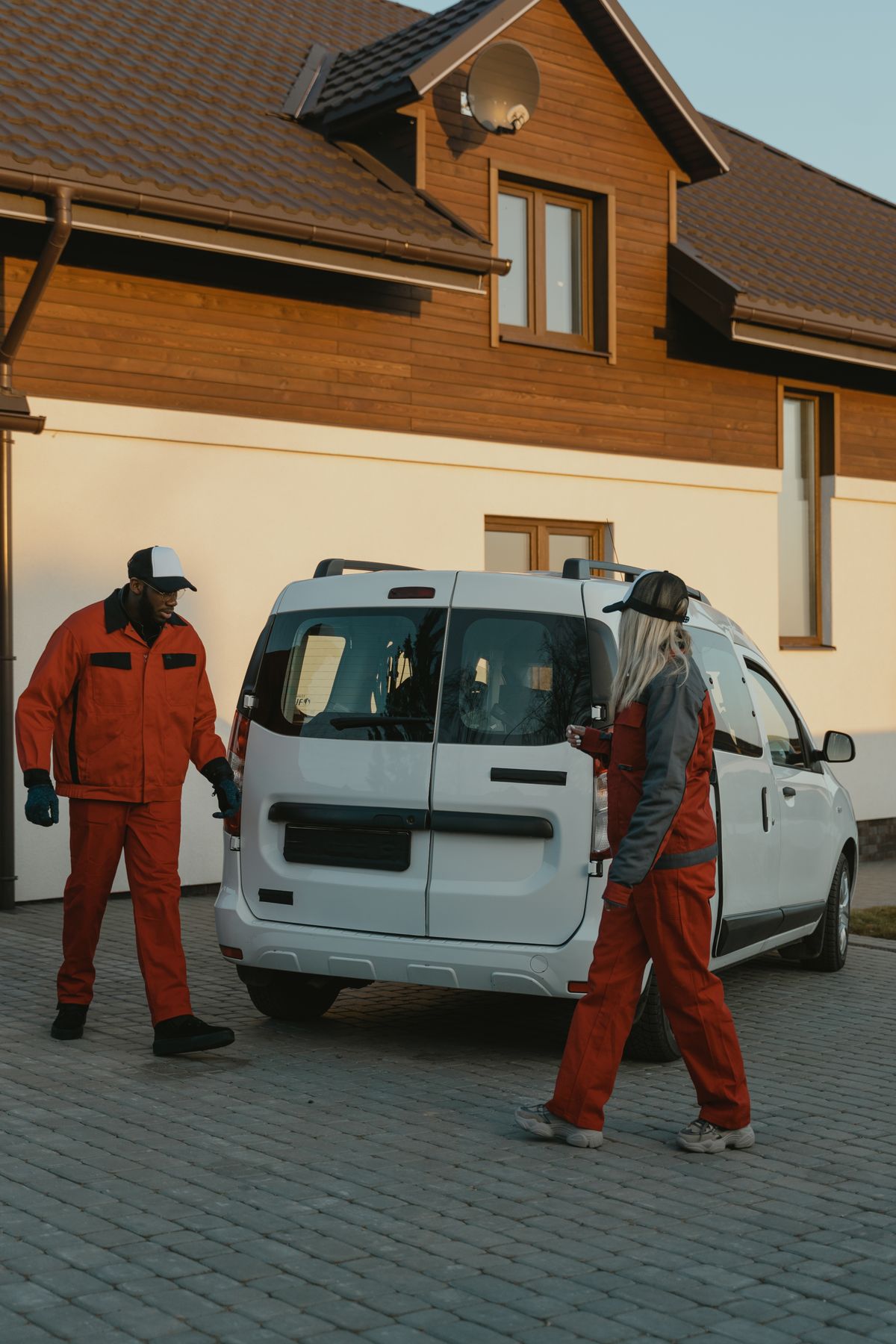 Uniformed Hanover Enterprise technicians arriving on-site for a make-ready job